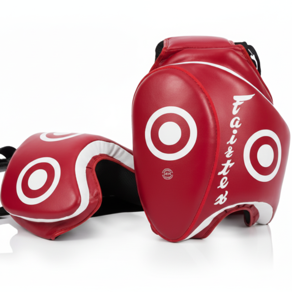 Red martial arts protective gear with white circular designs on a white background
