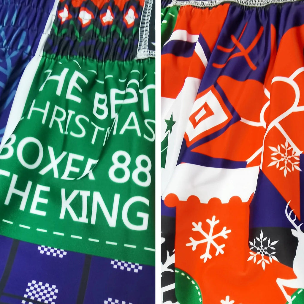 A close-up of elastic athletic fabric panels with holiday-themed printed patterns and text, including 'THE BEST CHRISTMAS BOXER 88 THE KING' on green and multicolor festive designs. The OIMOTI brand logo appears at the top left, with text reading 'SUPER ELASTIC FABRIC' and 'BREATHABLE AND SWEAT-WICKING'.