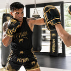 Venum MMA 4oz Boxing Gloves | Black & Gold