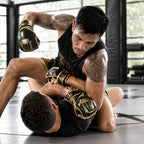 Venum MMA 4oz Boxing Gloves | Black & Gold