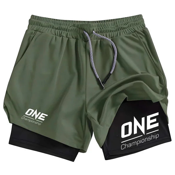 Olive green and black double-layer athletic shorts with 'ONE Championship' branding, displayed on a clean white background.