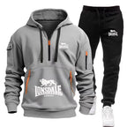 Gray hoodie and black pants set with Lonsdale branding on a white background