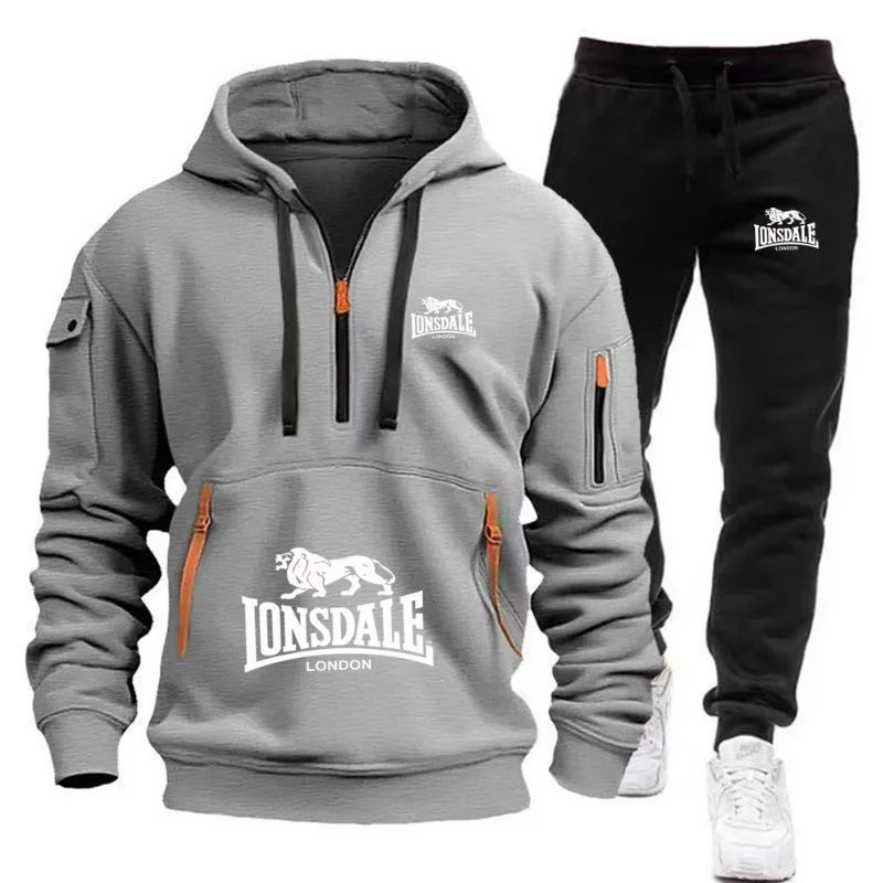 Gray hoodie and black pants set with Lonsdale branding on a white background
