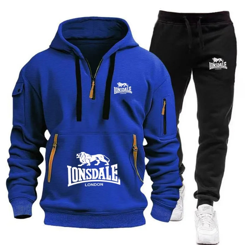 Blue hoodie and black pants with Lonsdale logo on a white background