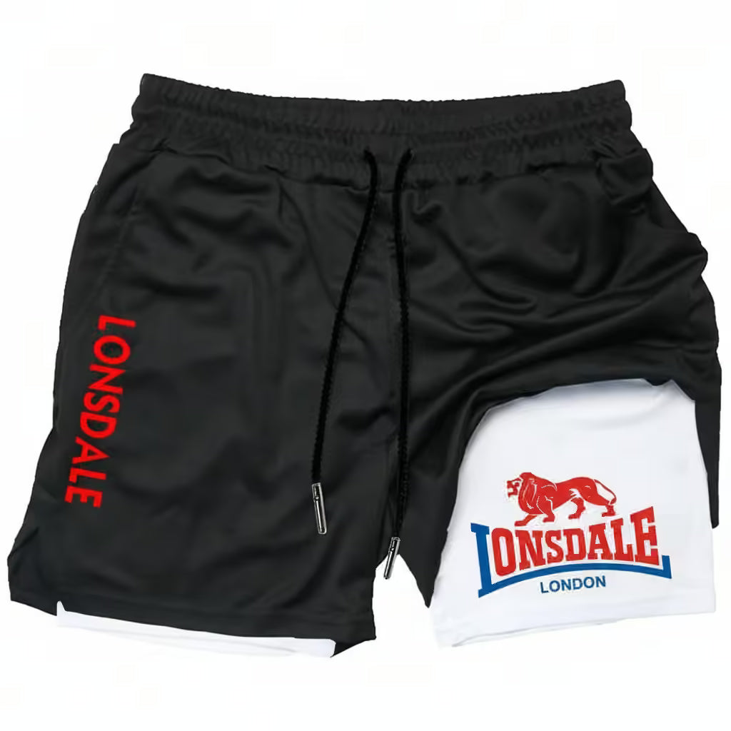Black athletic shorts with a white inner layer partially visible, featuring red and blue Lonsdale branding on the left leg and right leg, with a red lion logo.