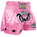 Pink boxing shorts with black star designs and 'FLUORY' branding on a gray background.