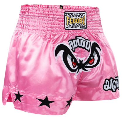 Pink boxing shorts with black star designs and 'FLUORY' branding on a gray background.