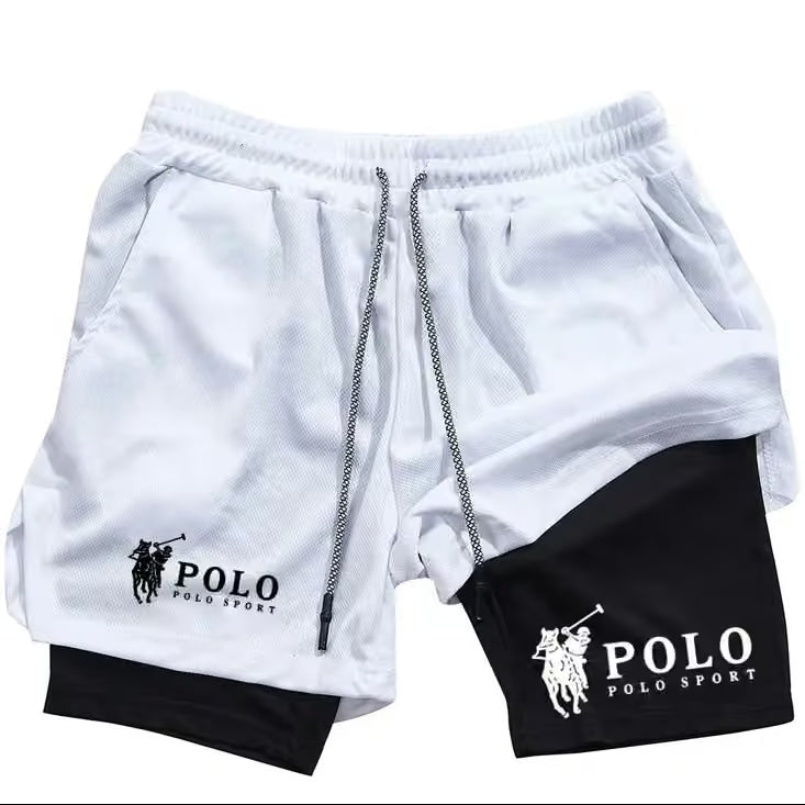 White and black Polo Sport athletic shorts with a drawstring waist and embroidered logos on the legs, shown on a plain white background.