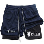 A pair of navy blue mesh athletic shorts with a black inner layer, featuring white Polo Ralph Lauren logos on both legs and a silver drawstring.