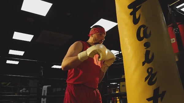 fairtex-punch-bags-being-punched-by-fighters-fitzone360