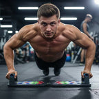 A shirtless man performing push-ups on a push-up board in a gym setting.