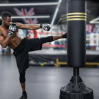Boxer in training with a punching bag in a gym setting