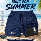 Navy blue shorts with FILA logo on a beach background, featuring text 'Built for Summer'.