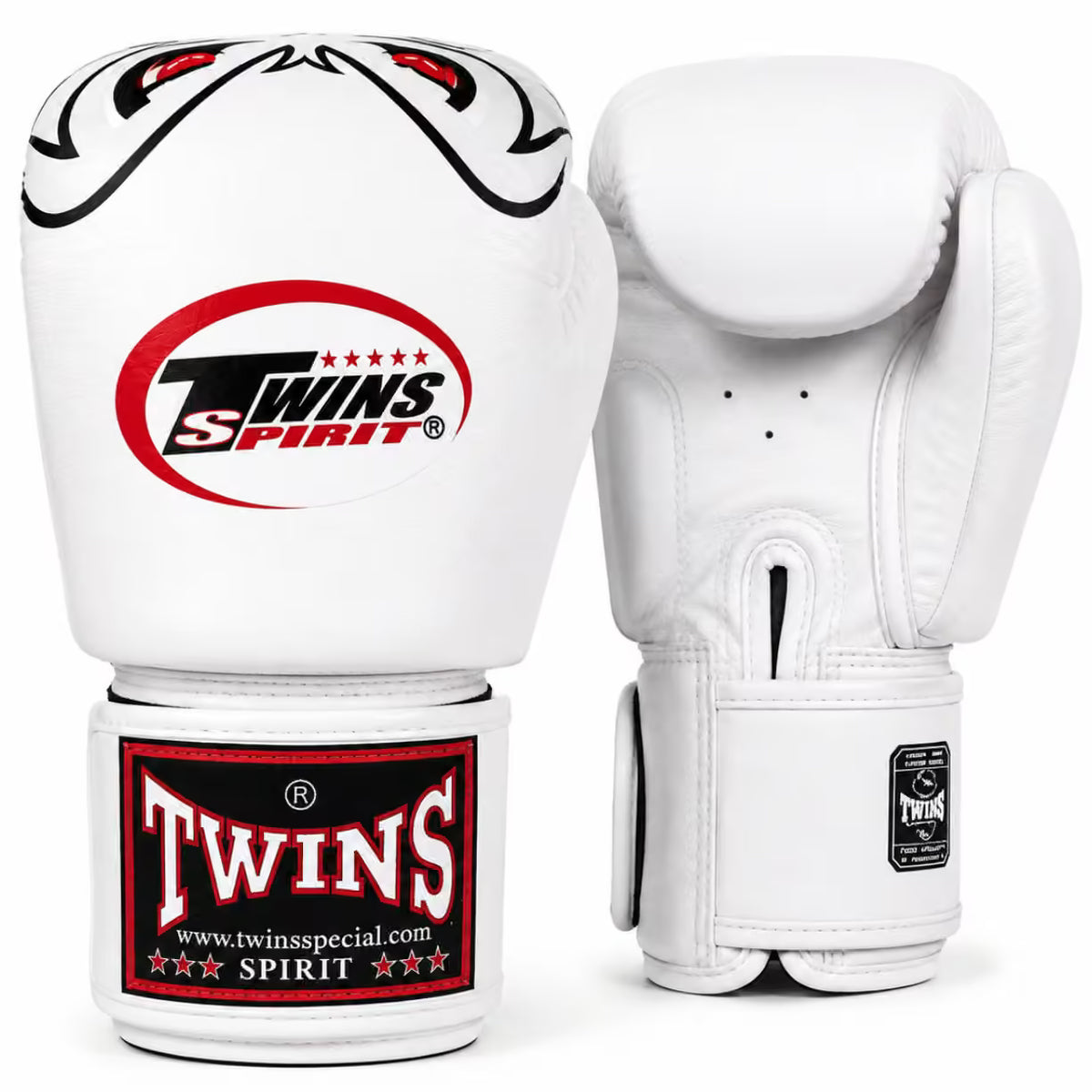 A pair of white Twins Spirit boxing gloves shown on a clean white background, with one glove facing forward to display the front logo and wrist strap, and the other showing the back and cuff.