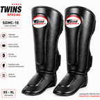 Black shin guards with Twins Special branding on a white background
