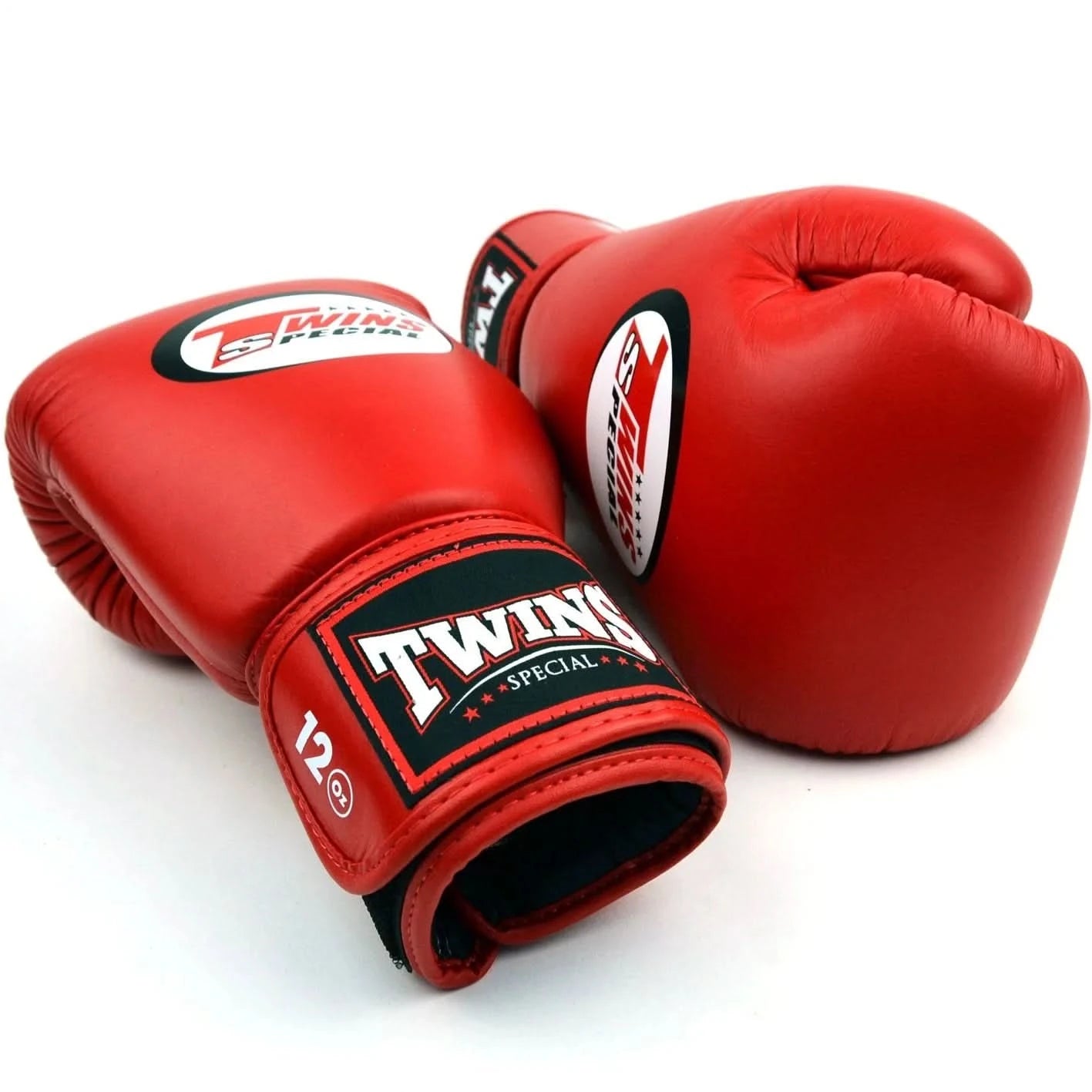 Red boxing gloves with Twins Special logo on a white background