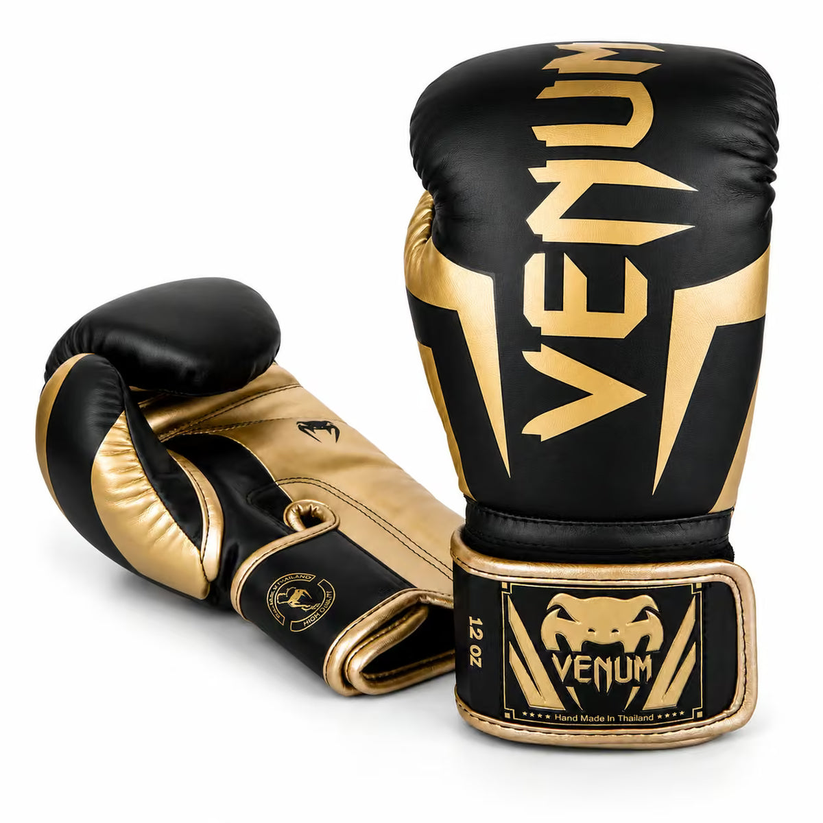 A pair of Venum boxing gloves in black and gold, displayed on a clean white background. One glove is positioned upright to show the front with the large gold Venum logo, and the other is angled to show the back and wrist strap with the Venum brand patch.