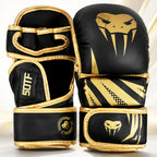 A pair of black and gold MMA gloves with a snake head logo, shown on a clean white background.