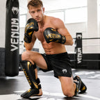Venum Muay Thai Shin Guards – Black & Gold | Premium Shin & Instep Protection