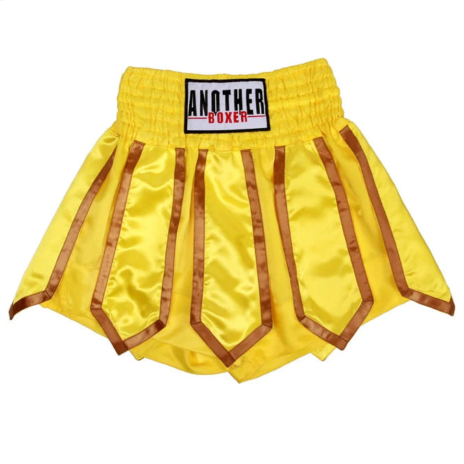 Yellow satin boxing shorts with brown trim and a black, white, and red 'ANOTHER BOXER' logo patch on the waistband, shown on a white background with 'Choice' store branding.